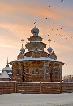 Wooden church, Suzdal, Russia in winter sunset