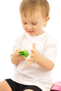  Nice little boy  is playing with empty balloons     