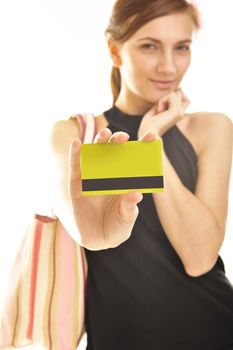 young woman holding plastic card   as a concept of shopping without cash problem