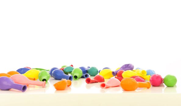  Colourful empty balloons over a white background