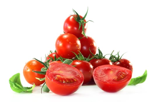 fresh, red tomatoes on white background