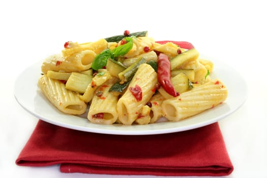 Tortiglione with fiery chili, zucchini, garlic and herbs