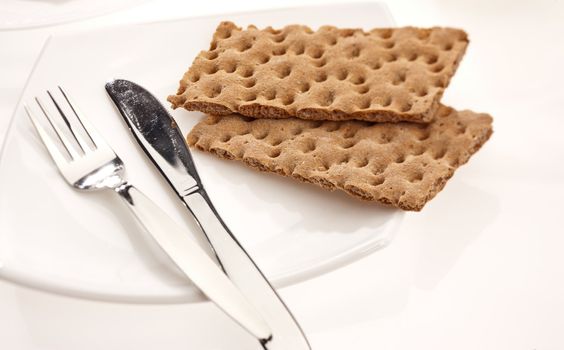 food series: tasty crust on plate with fork and knife