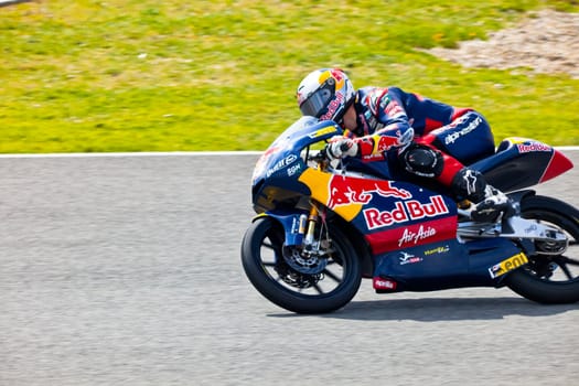 JEREZ DE LA FRONTERA, SPAIN - MAR 5:125cc pilot Jonas Folger races on the official training of the world championship of MotoGP on Mar 5, 2011, in Jerez de la Frontera, Spain