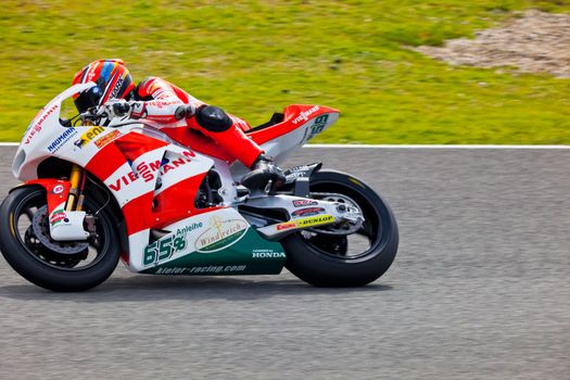 JEREZ DE LA FRONTERA, SPAIN - MAR 5: Moto2 pilot Stefan Bradl races on the official training of the world championship of MotoGP on Mar 5, 2011, in Jerez de la Frontera, Spain