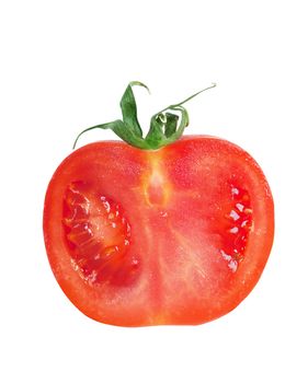Closeup view of a slice of tomato isolated on the white