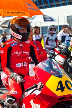 JEREZ DE LA FRONTERA, SPAIN - APR 17: Moto2 motorcyclist Roman Ramos waiting on the starting gates in the CEV Championship race on April 17, 2011 in Jerez de la Frontera, Spain.n Jerez de la Frontera, Spain.