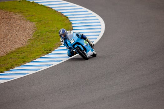 JEREZ DE LA FRONTERA, SPAIN - NOV 20: 125 motorcyclist Andre Pires takes a cuver in the CEV championship on Nov 20, 2010, in Jerez de la Frontera, Spain