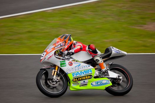 JEREZ DE LA FRONTERA, SPAIN - NOV 20: 125cc motorcyclist Niccolo Antonelli races in the CEV championship on Nov 20, 2010, in Jerez de la Frontera, Spain
