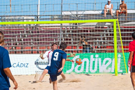 CADIZ, SPAIN -  JUL 30:  Unknown players of the team of Cadiz and Gijon playing the Spanish Championship of Beach Soccer on Jul 30, 2005 on the beach of La Victoria in Cadiz, Spain