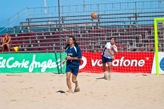 CADIZ, SPAIN -  JUL 30:  Unknown players of the team of Cadiz playing the Spanish Championship of Beach Soccer on Jul 30, 2005 on the beach of La Victoria in Cadiz, Spain