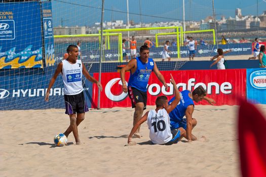 CADIZ, SPAIN -  JUL 22:  Unknown players of unknown team playing the Spanish Championship of Beach Soccer on Jul 22, 2006 on the beach of La Victoria in Cadiz, Spain