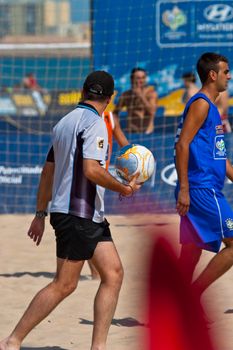 CADIZ, SPAIN -  JUL 22:  Unknow referee,  refereeing a match of the Spanish Championship of Beach Soccer on Jul 22, 2006 on the beach of La Victoria in Cadiz, Spain