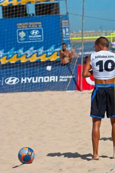 CADIZ, SPAIN -  JUL 22:  Unknown player of unknown team playing the Spanish Championship of Beach Soccer on Jul 22, 2006 on the beach of La Victoria in Cadiz, Spain