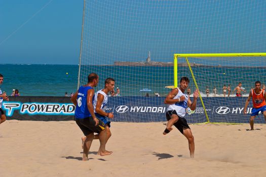 CADIZ, SPAIN -  JUL 22:  Unknown players of unknown team playing the Spanish Championship of Beach Soccer on Jul 22, 2006 on the beach of La Victoria in Cadiz, Spain