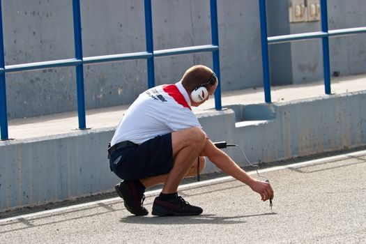 JEREZ DE LA FRONTERA, SPAIN - OCT 10: Bridgestone engineer waiting on pits on training session on October 10, 2006 on training session in Jerez de la Frontera , Spain