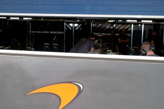 JEREZ DE LA FRONTERA, SPAIN - OCT 10: Engineers of Team McLaren Mercedes working in the car on pits on training session on October 10, 2006 in Jerez de la Frontera , Spain