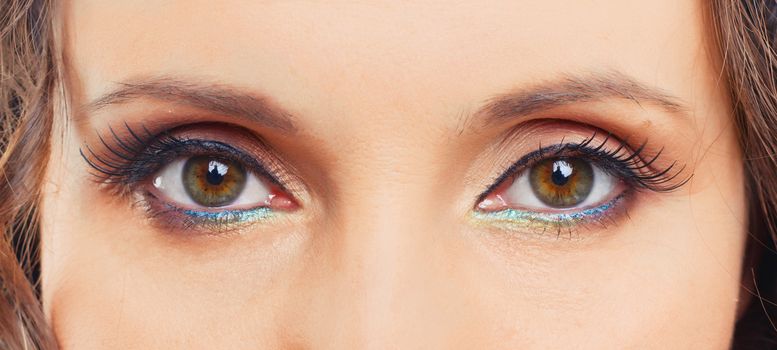 Close-up eyes of the young woman with fashion make-up