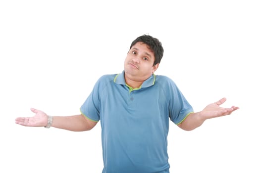 Portrait of man gesturing do not know sign against white background