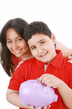 Portrait of a caring mother teaching her son to save money in piggybank over white background