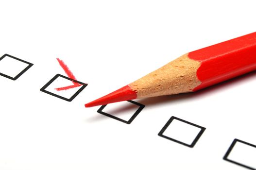 checkbox and red pen showing customer service survey or satisfaction concept to improve sales