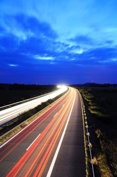 night traffic motion blur on highway showing car or transportation concept
