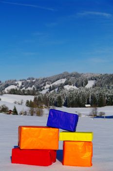 present parcels outside in a snowy landscape...