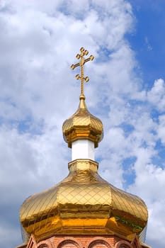 Gold copola. Christianity: �atholicity or orthodoxy church, Cross on sky background