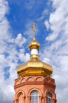 Gold copola. Christianity: �atholicity or orthodoxy church, Cross on sky background