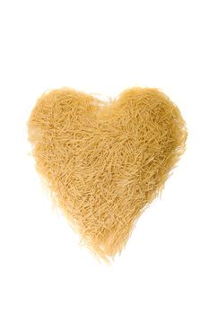 Noodles as heart on white background 