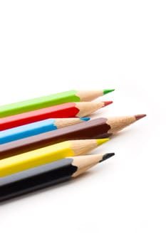 Colorful pencils on white background