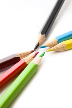 Colorful pencils on white background