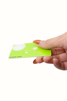 Female hand hold bonus card on white