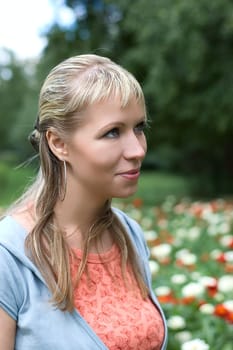 Portrait of the beautiful girl on natural background
