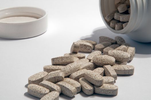 Box of pills on a white surface.