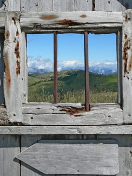 mountain landscape and  wood window 