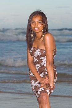 Attractive Caribbean girl posing at the beach