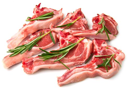 Racks of lamb, ready for cooking, with fresh rosemary