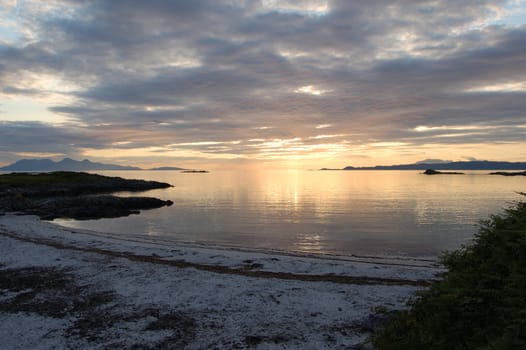 Sunsetting over the sea at Arisaig Scotland at the beach where Local Hero was filmed