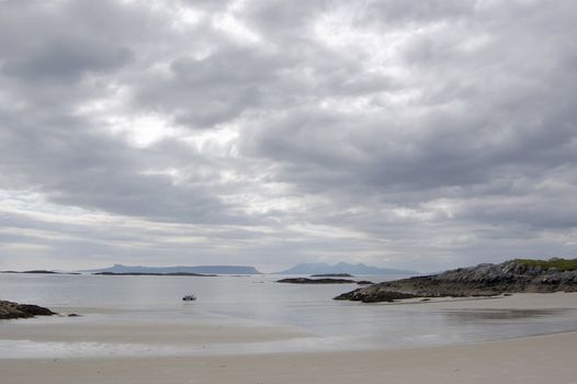 The islands of Eigg and Rum from the beach at Arisaig, Scotland where the film Local Hero was made.