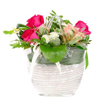 Bunch of roses in a vase isolated on white background