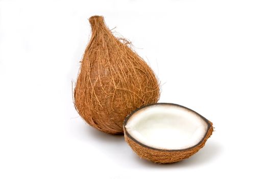 Coconut open, isolated on a white background and a full coconut