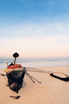 Old fishing boat on the lonely beach