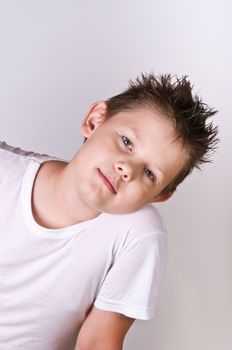 Portrait of emotionally kid. Funny little boy. Beautiful caucasian model.