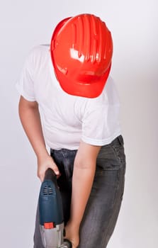 Portrait of a boy in a red protective helmet