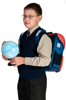 Schoolboy. Isolated over white background. The boy is dressed in a vest.