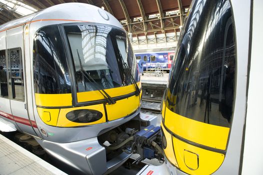 Two passanger trains in Padington raiway station in London