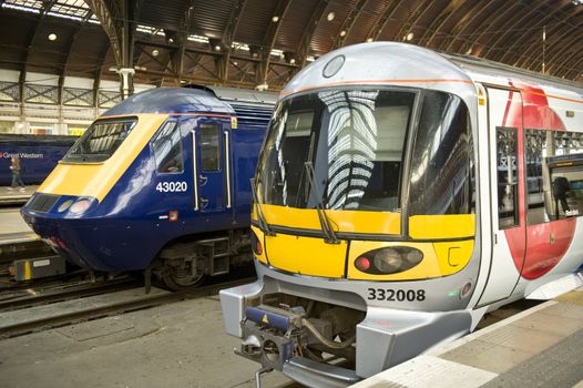 Two passanger trains in Padington raiway station in London