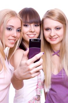 three girls with phone on a white background