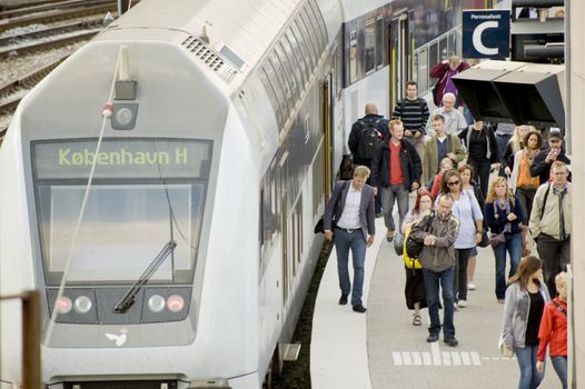 Train arrival in Copengagen central raiiway station, Denmark